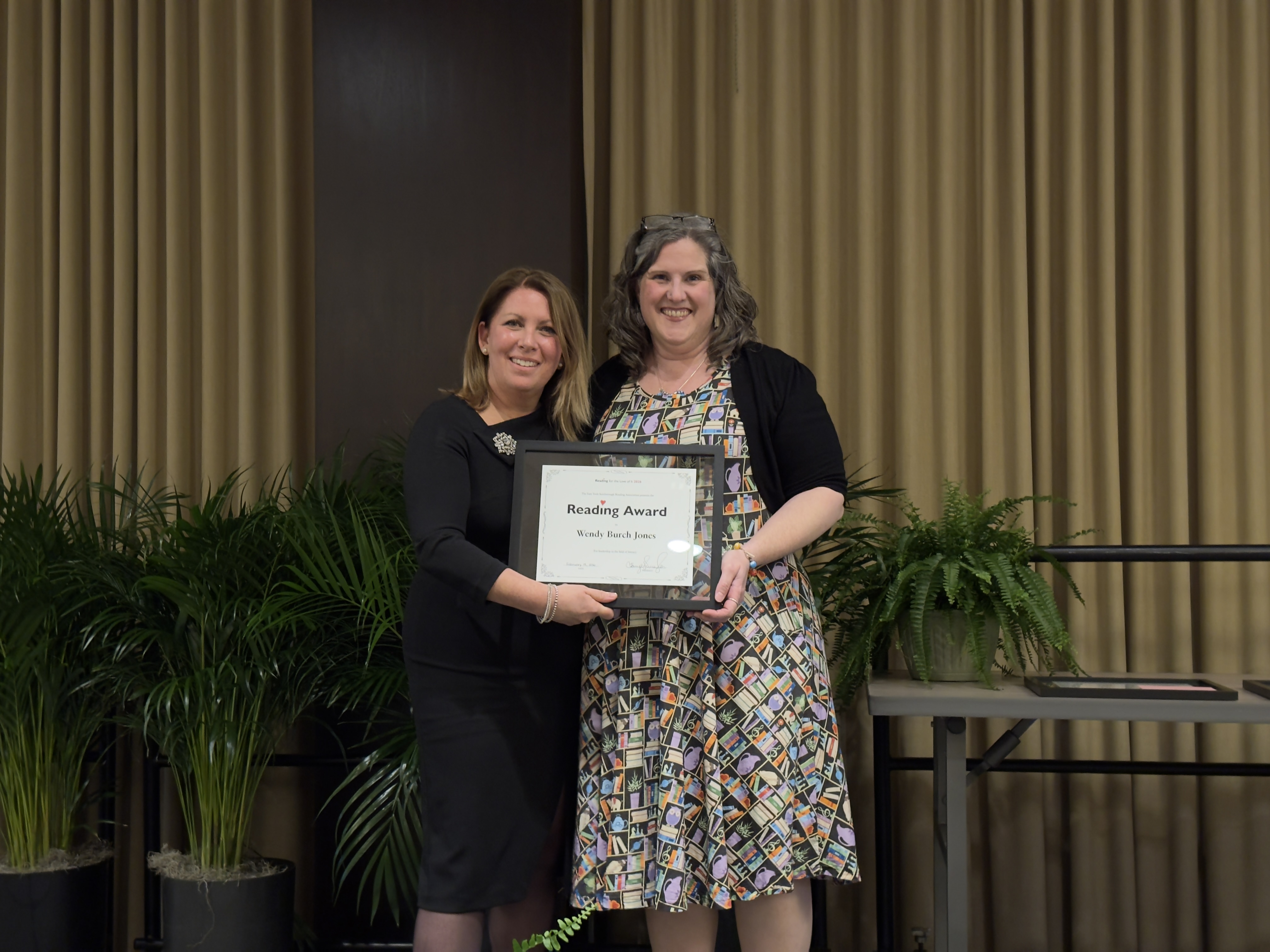 Wendy Burch Jones winning a Reading Award